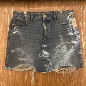 High-waisted button fly cut off Jean skirt